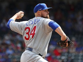 Chicago Cubs starting pitcher Jon Lester (34) throws in the first inning of a baseball game against the Texas Rangers Thursday, March 28, 2019 in Arlington, Texas.