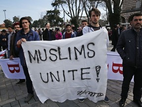 Demonstrators protest against the mosque attacks in New Zealand during a protest in Istanbul, Saturday, March 16, 2019. World leaders expressed condolences and condemnation following the deadly attacks on mosques in the New Zealand city of Christchurch, while Muslim leaders said the mass shooting was evidence of a rising tide of violent anti-Islam sentiment.