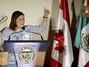 Ambassador of Mexico to the U.S., Martha Barcena, gives a thumbs up at the 2019 Arizona-Mexico Commission Governor's Luncheon, as she speaks in front of Arizona Gov. Doug Ducey Tuesday, March 19, 2019, in Phoenix.