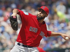 Boston Red Sox pitcher David Price pitches in the first inning of a spring training baseball game against the Chicago Cubs Tuesday, March 26, 2019, in Mesa, Ariz.
