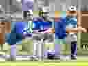 Toronto Blue Jays pitcher Marcus Stroman, left, Blue Jays infielder Devon Travis, centre, and Blue Jays outfielder Randal Grichuk, right, watch during baseball spring training in Dunedin, Fla., on Wednesday, February 20, 2019. 