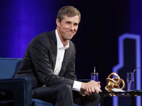 FILE - In this Feb. 5, 2019, file photo, former Democratic Texas congressman Beto O'Rourke smiles during an interview with Oprah Winfrey live on a Times Square stage at "SuperSoul Conversations," in New York. O'Rourke sent a text message Wednesday to El Paso TV station KTSM saying he's running for the Democratic presidential nomination.
