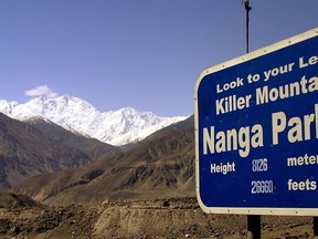 FILE - In this undated file photo, the snow-capped mountain of Nanga Parbat is seen in northern Pakistan. A Pakistani mountaineering official says military helicopters could not drop off four Spanish rescuers to search for a missing pair of European climbers because of heavy snowing.