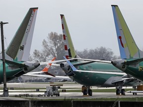 In this Nov. 14, 2018, file photo Boeing 737 MAX 8 planes are parked near Boeing Co.'s 737 assembly facility in Renton, Wash.