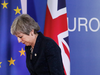 British Prime Minister Theresa May leaves after addressing a media conference at an EU summit in Brussels, March 22, 2019.