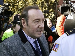 FILE - In this Jan. 7, 2019 file photo, actor Kevin Spacey departs from district court after arraignment on a charge of indecent assault and battery in Nantucket, Mass. Attorneys for Spacey are heading back to court in the case accusing the disgraced actor of groping an 18-year-old man at a Massachusetts bar in 2016. A pretrial hearing is set for Monday, March 4, in the Nantucket District Court. The judge has said that Spacey is not required to attend, but must be available by phone.