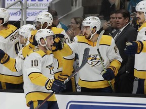 Nashville Predators' Colton Sissons (10) is congratulated after scoring a goal against the San Jose Sharks during the first period of an NHL hockey game Saturday, March 16, 2019, in San Jose, Calif.