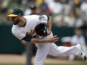Oakland Athletics pitcher Mike Fiers works against the Los Angeles Angels in the first inning of a baseball game Thursday, March 28, 2019, in Oakland, Calif.