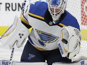 St. Louis Blues goalie Jake Allen makes a save against the San Jose Sharks in the third period of an NHL hockey game Saturday, March 9, 2019, in San Jose, Calif.