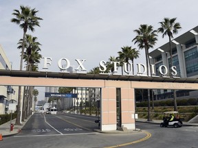 The exterior of Fox Studios is pictured, Tuesday, March 19, 2019, in Los Angeles. Disney's $71.3 billion acquisition of Fox's entertainment assets is set to close around 12 a.m. EDT on Wednesday.