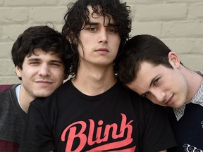 This March 20, 2019 photo shows Braeden Lemasters, from left, Cole Preston and Dylan Minnette of the indie rock band Wallows posing for a portrait at SIR Studios in Los Angeles.