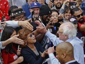 Democratic presidential candidate Sen. Bernie Sanders, I-Vt., greets supporters at a rally at Grand Park in Los Angeles, Saturday, March 23, 2019. The Vermont senator made a notable, second-place finish in California's 2016 presidential primary when he won 27 of 58 counties.