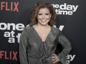 FILE - In this Wednesday, Jan. 24, 2018 file photo, Justina Machado attends the Los Angeles premiere of "One Day at a Time" Season 2 at ArcLight Hollywood, in Los Angeles. Netflix is cancelling "One Day at a Time" after three seasons. In a statement Thursday, March 14, 2019, the streaming service's chief content office, Ted Sarandos, called it "disappointing" that more viewers didn't discover the sitcom.