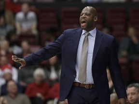 FILE - In this March 7, 2019, file photo, California coach Wyking Jones gestures during the first half of his team's NCAA college basketball game against Stanford in Stanford, Calif. California fired Jones after winning just eight games in each of his first two seasons.