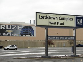 FILE - This Nov. 27, 2018 file photo, shows the General Motors Lordstown West plant in Lordstown, Ohio. General Motors' sprawling Lordstown assembly plant near Youngstown is about to end production of the Chevrolet Cruze sedan, ending for now more than 50 years of auto manufacturing at the site. The jobs of over 1,000 hourly workers will be eliminated when production ends Wednesday afternoon, March 6, 2019, and a contingent of workers finish making replacement parts like hoods and fenders sometime later this month.