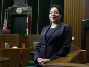 FILE - In this May 5, 2017, file photo, St. Louis Circuit Attorney Kim Gardner poses for a photo in St. Louis. An attorney for St. Louis Circuit Attorney Kim Gardner is accusing police, a special prosecutor and a judge of trying to "intimidate and humiliate" her through a search warrant of electronic records in her office. The search warrant is part of an investigation into whether a man Gardner hired last year to investigate former Gov. Eric Greitens lied under oath during a deposition.