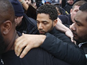 FILE - In this Feb. 21, 2019 file photo, "Empire" actor Jussie Smollett leaves Cook County jail following his release in Chicago. A Cook County grand jury on Friday, March 8, 2019 has indicted Smollett on 16 felony charges after authorities say he falsely told police that he was attacked by two men in Chicago.