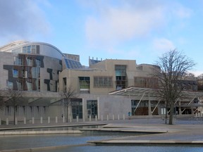 A general view of the Scottish Parliament in Edinburgh, Scotland is shown on March 16, 2014. A Scottish parliamentarian is continuing her fight for a Newfoundland woman who has accused her co-workers of bullying and harassment. Rhoda Grant is calling for an independent investigation into what happened to DeeAnn Fitzpatrick. Fitzpatrick, who is originally from Bell Island, N.L. but has been living in Scotland for decades, spoke out a few years ago after a photo of her bound and gagged and taped to a chair at her workplace came to light. Grant, who has represented Fitzpatrick for a decade, raised the matter in the Scottish parliament on Thursday.