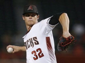 Arizona Diamondbacks starter Clay Buchholz throws a pitch to a Los Angeles Angels batter during the first inning of a baseball game Wednesday, Aug. 22, 2018, in Phoenix. The Toronto Blue Jays have signed free agent RHP Clay Buchholz to a one-year contract (US $3,000,000).