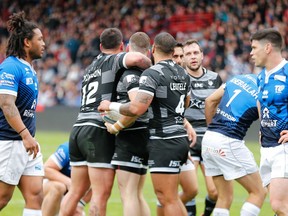 Toronto Wolfpack players, black jersey, celebrate against Toulouse Olympique during the Betfred Championship Round 6 fixture in Toulouse, France on Saturday, March 9, 2019 in this handout photo.