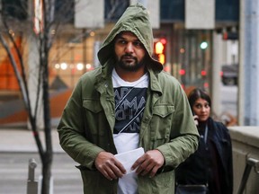 Sukhmander Singh, owner of the trucking company involved in the Humboldt Broncos bus crash, arrives at court to face non-compliance charges under federal and provincial safety regulations in Calgary on November 9, 2018.