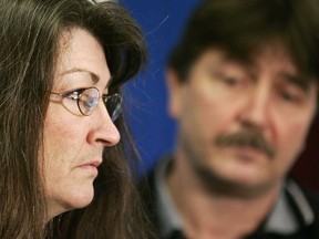 Corrine and Doug De Patie speak to reporters during a press conference in Vancouver on February 3, 2006. The mother of a young British Columbia gas station attendant dragged to death under a vehicle more than a decade ago, says she is "numb" to learn her son's killer has died. Corinne De Patie says she has received a copy of the death certificate for Darnell Pratt, the man who was just 16 in March, 2005 when he tried to drive away from a suburban Vancouver gas station without paying.