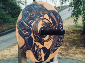 "Spindle Whorl," a First Nations piece of art created and designed by local carver Joel Good, is shown on display at Maffeo Sutton Park in Nanaimo, B.C., in this undated handout photo. RCMP say a "significant" piece of public art that was a fixture in downtown Nanaimo, B.C., has been stolen. The Mounties say in a news release that the art piece, a carved wooden disc known as a spindle whorl, was created and designed by local carver Joel Good. The City of Nanaimo says online that spindle whorls were historically used for spinning wool into yarn and have become iconic symbols for members of the Snuneymuxw First Nation, with carvings that often depict family stories and legends.