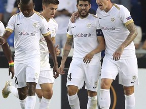Genk's Alejandro Pozuelo, second right, and Sebastien Dewaest, right, celebrate after Genk scored their sides first goal during an Europa League group I soccer match against Malmo in Genk, Belgium on September 20, 2018. Spanish playmaker Alejandro Pozuelo is formerly introduced by Toronto FC at a BMO Field news conference. The MLS side hopes that the former KRC Genk star in Belgium can help fill the void on offence left by the departures of Sebastian Giovinco and Victor Vazquez.