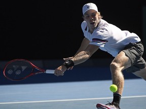 Canada's Denis Shapovalov makes a backhand return to Serbia's Novak Djokovic during their third round match at the Australian Open tennis championships in Melbourne, Australia, Saturday, Jan. 19, 2019. It wasn't that long ago when success on the Canadian singles tennis scene was a relative rarity.