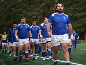 Toronto Arrows prop Morgan Mitchell walks out with teammates ahead of a game against the Seattle Seawolves in Seattle on February 17, 2019. New Zealand prop Morgan Mitchell has been a force on the field for the expansion Toronto Arrows. His rise in rugby is unique. Mitchell was deaf up until several years ago when a cochlear implant restored his hearing.