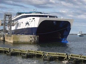 The CAT, a high-speed passenger ferry, prepares to depart Yarmouth, N.S. heading to Portland, Maine on its first scheduled trip on Wednesday, June 15, 2016. The private operator of the Nova Scotia-Maine ferry is appealing to opposition politicians to tone down the rhetoric surrounding the heavily subsidized service, saying it is disruptive to the business.