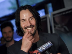 Actor Keanu Reeves attends the premiere of "Siberia" at Metrograph, Wednesday, July 11, 2018, in New York. Actors Alex Winter and Reeves jumped on social media to announce plans for a third installment to the cult comedy franchise about two time-travelling California dudes.