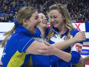 Alberta lead Rachel Brown, second Dana Ferguson and skip Chelsea Carey react after defeating Ontario 8-6 to win the Scotties Tournament of Hearts at Centre 200 in Sydney, N.S. on February 24, 2019. Chelsea Carey will begin her quest to give Canada a rare three-peat at the women's world curling championship starting Saturday in Denmark. The Calgary skip leads her team of third Sarah Wilkes, second Dana Ferguson and lead Rachel Brown in the March 16-24 competition at the Silkeborg Sportscenter.