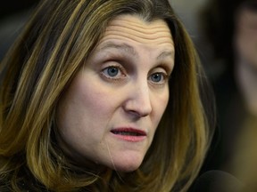 Minister of Foreign Affairs Chrystia Freeland speaks to media following a cabinet meeting on Parliament Hill in Ottawa on Tuesday, Jan. 29, 2019. Foreign Affairs Minister Chrystia Freeland is applauding the bipartisan American political effort to support Canada in its fight with China over its detention of Huawei's chief financial officer.