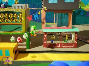 A scene from "Yoshi's Crafted World" for the Nintendo Switch is shown in this undated handout photo. When video game superstar Mario ventures across hostile worlds to rescue royalty and defeat menacing monsters, he can usually rely on his dependable sidekick Yoshi. The friendly dinosaur with the cast-iron stomach often ferries Mario around dangerous landscapes and stomps enemies, always with a smile on his face. But Yoshi is also a star in his own right, with several successful solo adventures that let his personality shine.