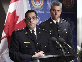 Supt. Peter Lambertucci, left, Officer in Charge INSET Ottawa, RCMP "O" Division, answers questions from reporters as Chief Supt. Michael LeSage, Criminal Operations Officer looks on, during a press conference, after RCMP charged a youth with terrorism, in Kingston, Ont. on January 25, 2019. A youth charged with terrorism-related offences appeared in a Kingston, Ont., courtroom Friday for the second part of a two-day bail hearing. The youth, who cannot be identified under provisions of the Youth Criminal Justice Act, was mostly expressionless while the court went through the proceedings.