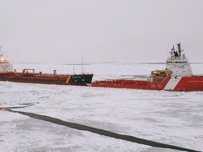 CCGS Captain Molly Kool (right) tows the tanker Jana Desgagnes in a handout photo from the Canadian Coast Guard. The Coast Guard is working to retrieve a tanker carrying eight million litres of refined petroleum and additional fuel that lost steering off the southwest coast of Newfoundland Thursday morning. THE CANADIAN PRESS/HO-Canadian Coast Guard MANDATORY CREDIT