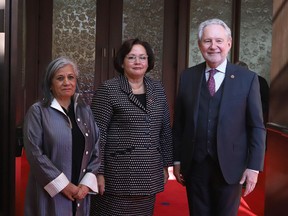 Recently-appointed Senator Rosemary Moodie (centre) poses for a photograph with Senator Ratna Omidvar (left)and Senator Peter Harder (left)outside the Senate Chamber in Ottawa on Tuesday February 19, 2019. Omidvar has proposed a private member's bill that would allow the government to repurpose the frozen assets of dictators and their cronies to help refugees forced to flee their tyranny.