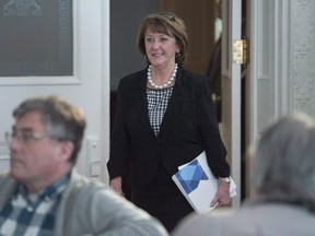 Nova Scotia Finance Minister Karen Casey arrives to brief reporters before she tables her budget at the legislature in Halifax on Tuesday, March 20, 2018.