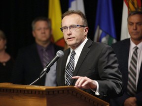 Jim Reiter, Saskatchewan Minister of Health responds to a reporter's questions at a press conference during the Conferences of Provincial-Territorial Ministers of Health in Winnipeg, Thursday, June 28, 2018.