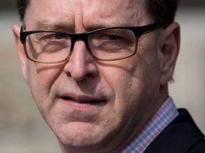 British Columbia Health Minister Adrian Dix pauses while speaking at Woodlands Memorial Garden in New Westminster, B.C., on Saturday March 31, 2018. British Columbia has recorded 19 confirmed cases of measles this year and the province is responding by launching a measles immunization catch-up drive next month, aiming to vaccinate 95 per cent of the province's youth.