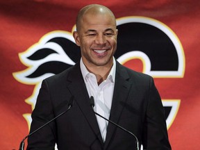 Former Calgary Flames captain Jarome Iginla announces his retirement from the NHL, after playing 20 seasons, at a news conference in Calgary on July 30, 2018. The Flames will retire Iginla's jersey in a ceremony on Saturday.
