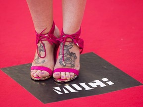 The shoes of Jillea are shown on the red carpet during the Much Music Video Awards in Toronto on Sunday, June 19, 2016. Music videos have struck another sour note at cable channel Much.After decades of dominating airwaves in the daytime hours, the channel's owner Bell Media is reducing its weekday block of mainstream hits and classics from seven hours to a single midday hour.THE CANADIAN PRESS/Mark Blinch
