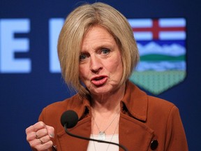 Alberta Premier Rachel Notley responds to recommendations from the National Energy Board for proceed with the Trans Mountain pipeline, at a media availability in Calgary on Friday, Feb. 22, 2019. On International Women's Day, Alberta Premier Rachel Notley and Opposition Leader Jason Kenney are locking horns over the best way to recruit female political candidates.