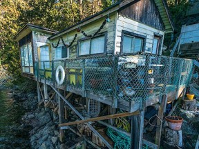 A photo of a home in Belcarra, B.C. is shown in this undated handout image. Seniors who own rustic cabins in a remote area near Vancouver say they face thousands of dollars in speculation taxes even though their properties are not suitable rental homes.