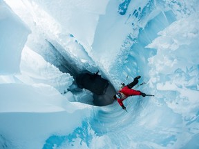 From climbing a frozen Niagara Falls to setting world paragliding records, Will Gadd, shown in a handout photo, is no stranger to adventure. Rappeling into a hole to descend deep into the bowels of the Greenland ice cap, however, was a whole different beast.