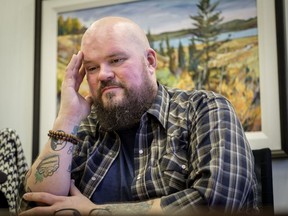 Former Syncrude firefighter Michael Swan talks about his situation in Calgary, Alta., Monday, Jan. 14, 2019. Oilsands giant Syncrude Canada wants a judge to dismiss a lawsuit by a former first responder who claims he was wrongfully fired following a diagnosis of post-traumatic stress disorder.