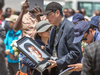 A family member holds a framed photo of loved one at the scene where the Ethiopian Airlines Boeing 737 Max 8 crashed shortly after takeoff on Sunday killing all 157 on board, near Bishoftu, Ethiopia, March 13, 2019.