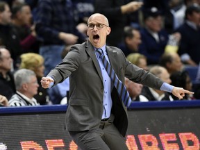 Connecticut head coach Dan Hurley reacts to a foul call in the first half of an NCAA college basketball game against Temple, Thursday, March 7, 2019, in Storrs, Conn.