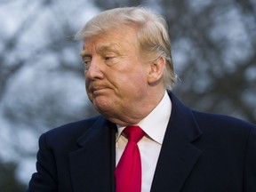 President Donald Trump turns to depart after speaking with the media after stepping off Marine One on the South Lawn of the White House, Sunday, March 24, 2019, in Washington. The Justice Department said Sunday that special counsel Robert Mueller's investigation did not find evidence that President Donald Trump's campaign "conspired or coordinated" with Russia to influence the 2016 presidential election.